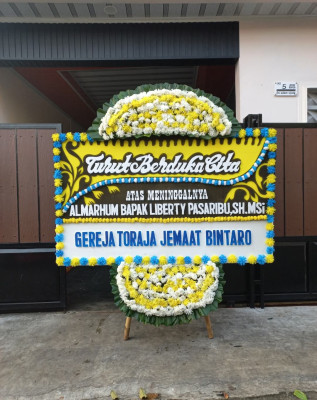 Papan Bunga Duka di Pelita Jaya